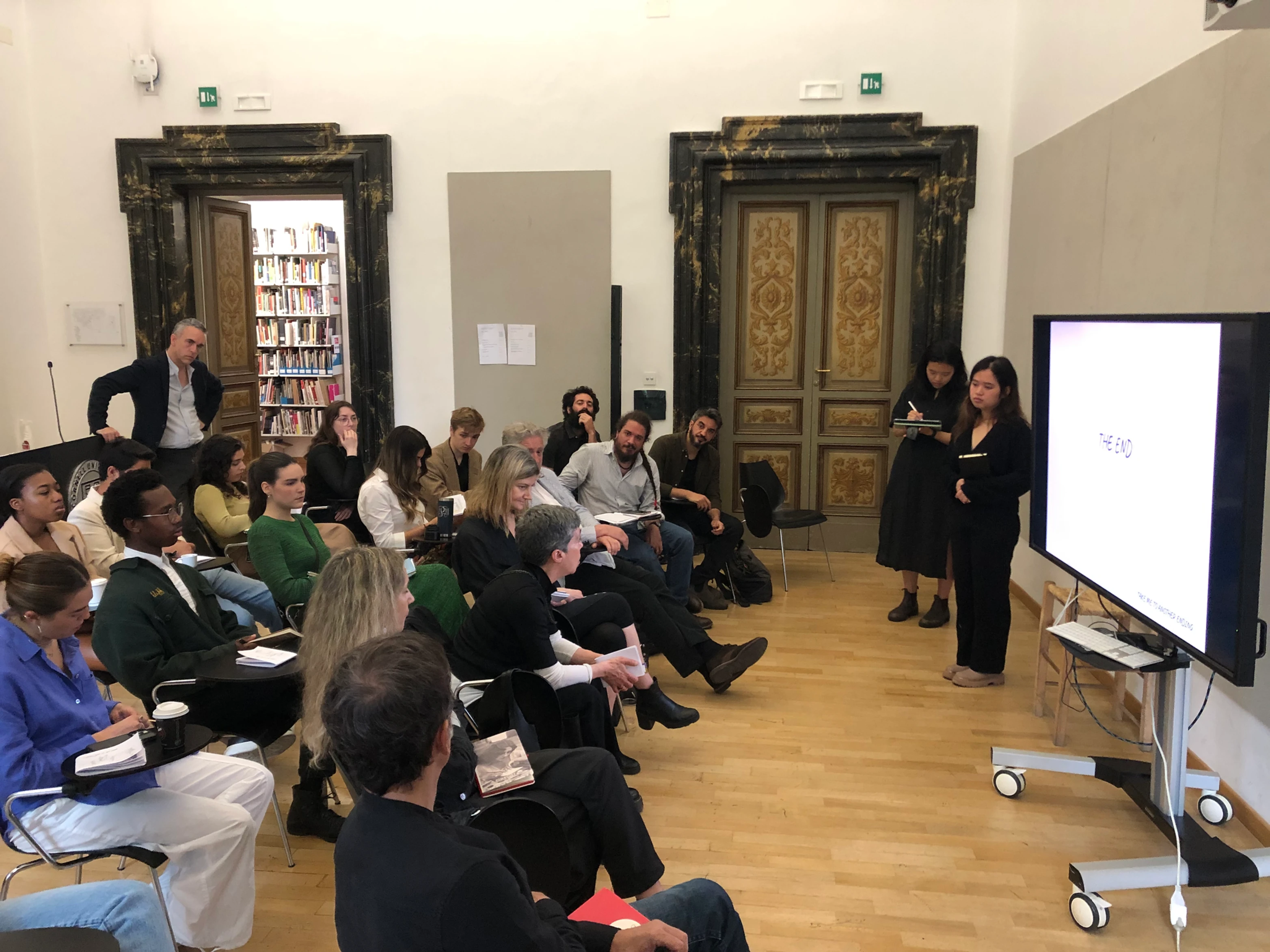 Thuan and I presenting our final project to a room of critiques and classmates.