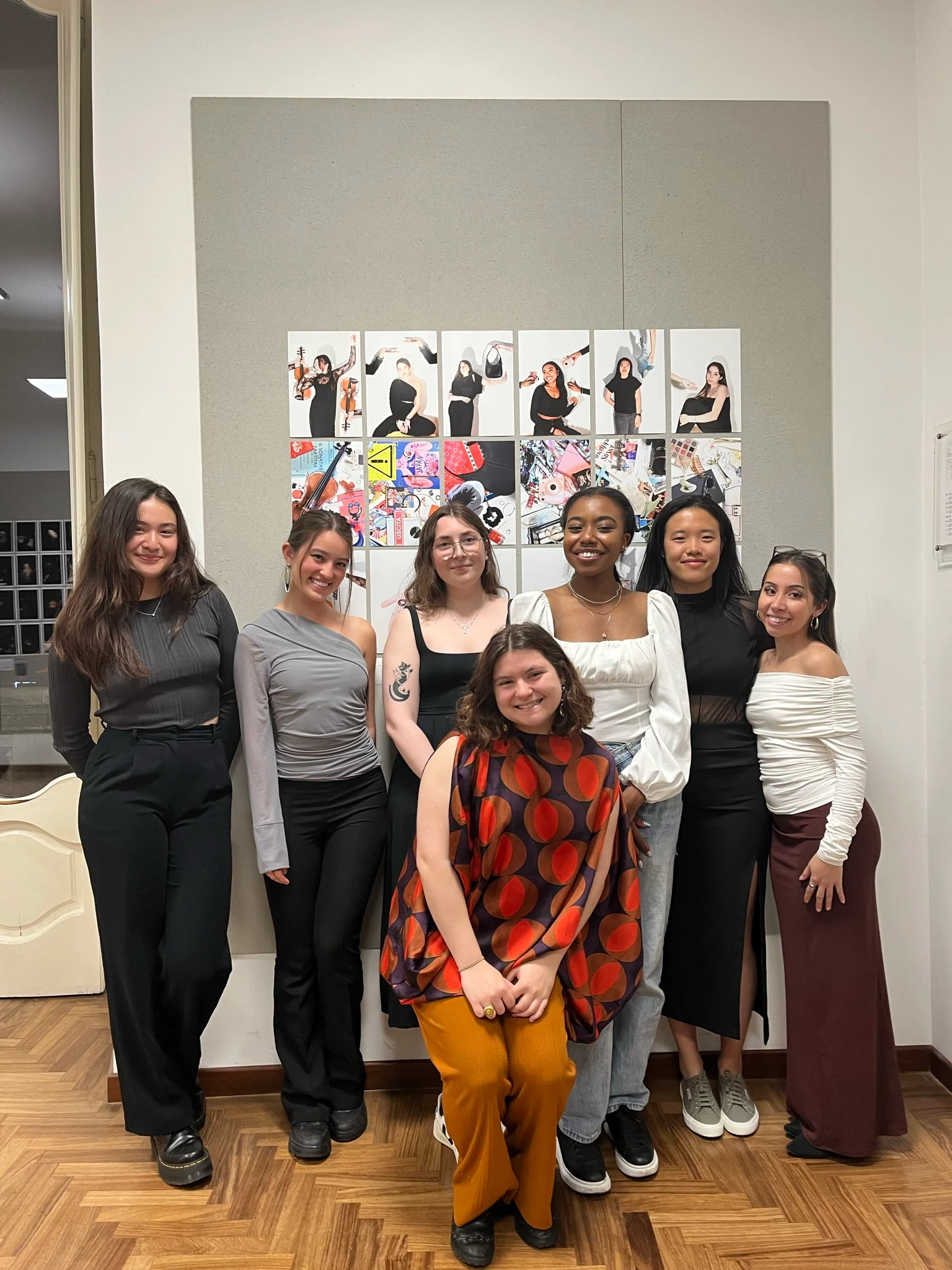 Sophie and us in front of her photography pieces.