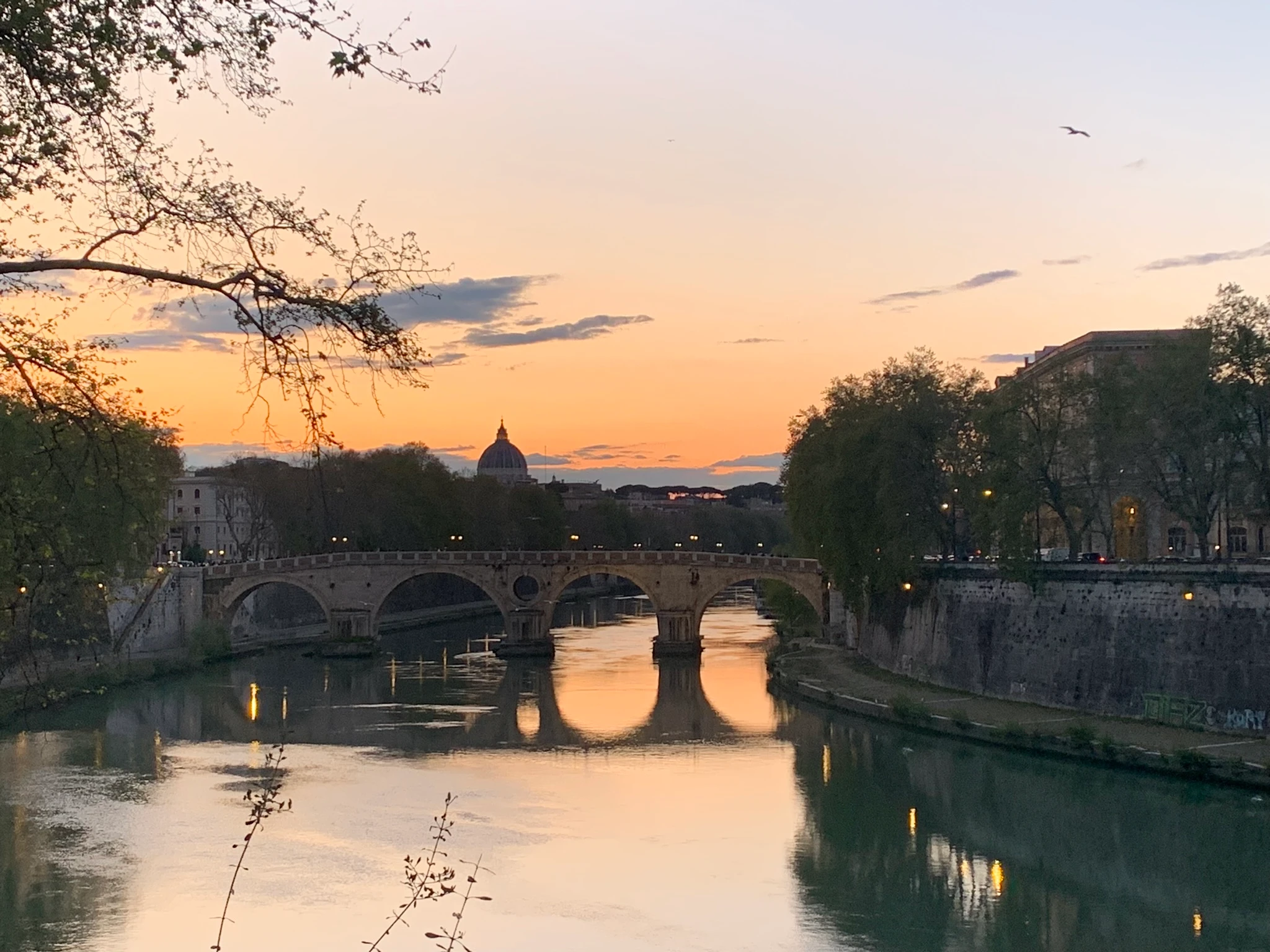 Sunset over the Tiber River.