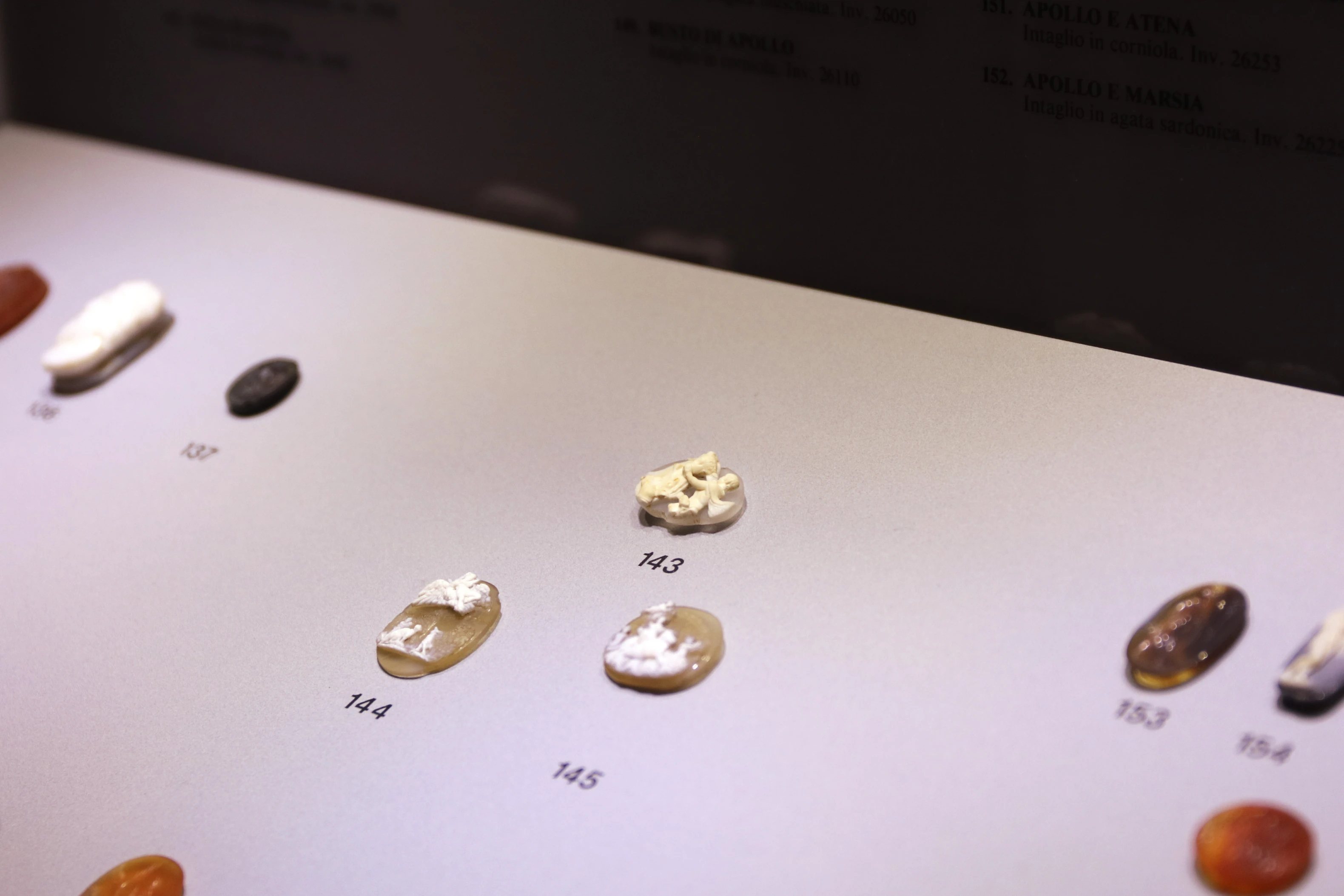 Cameo, a carved relief made from one stone with two contrasting colors.