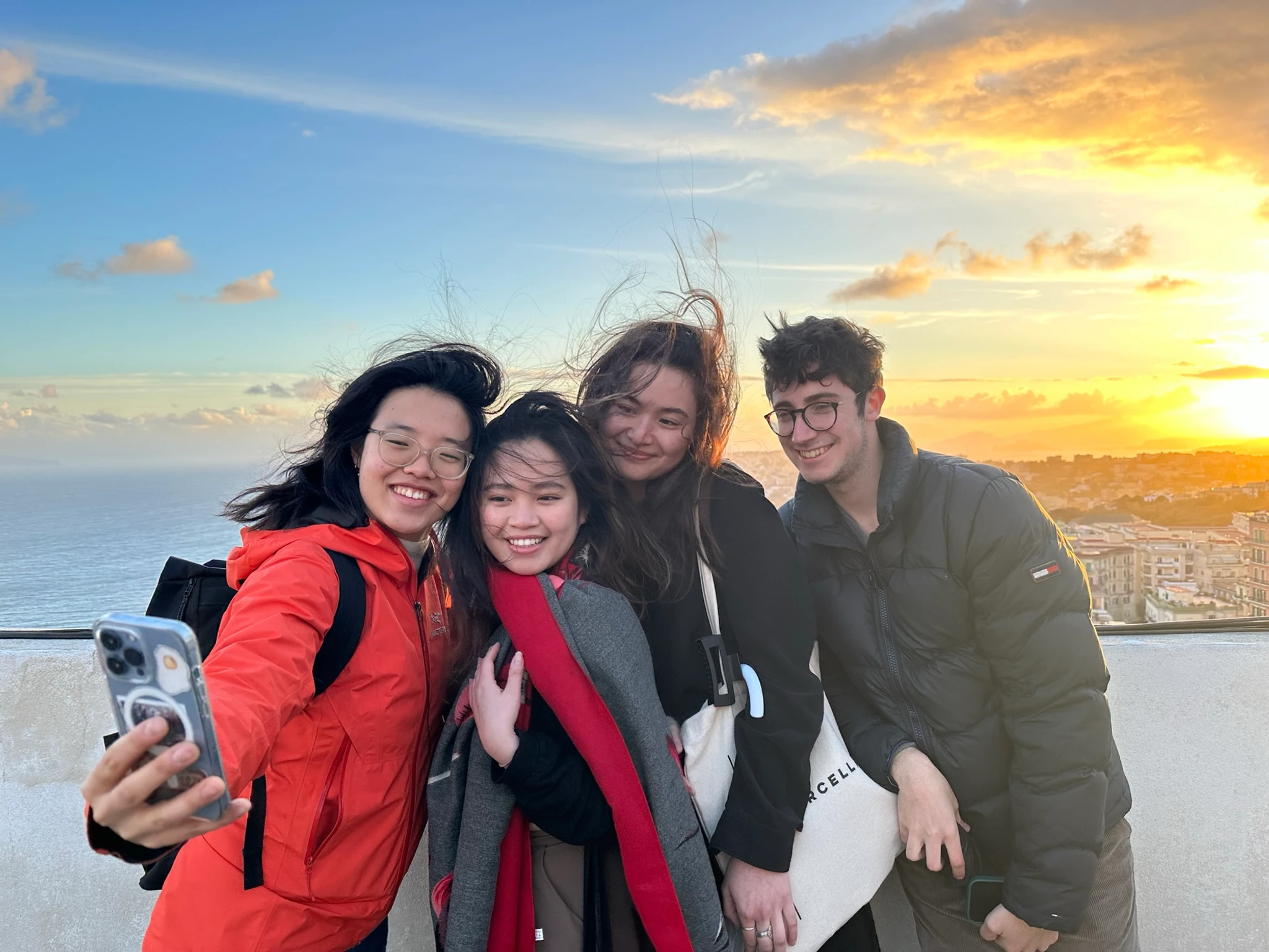 Group photo on Sant Elmo at sunset, with the Bay of Naples in the background.
