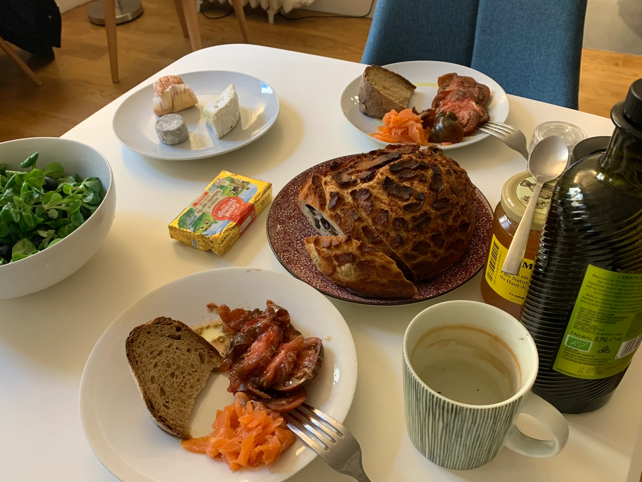 Bread and cheese laid on the table.