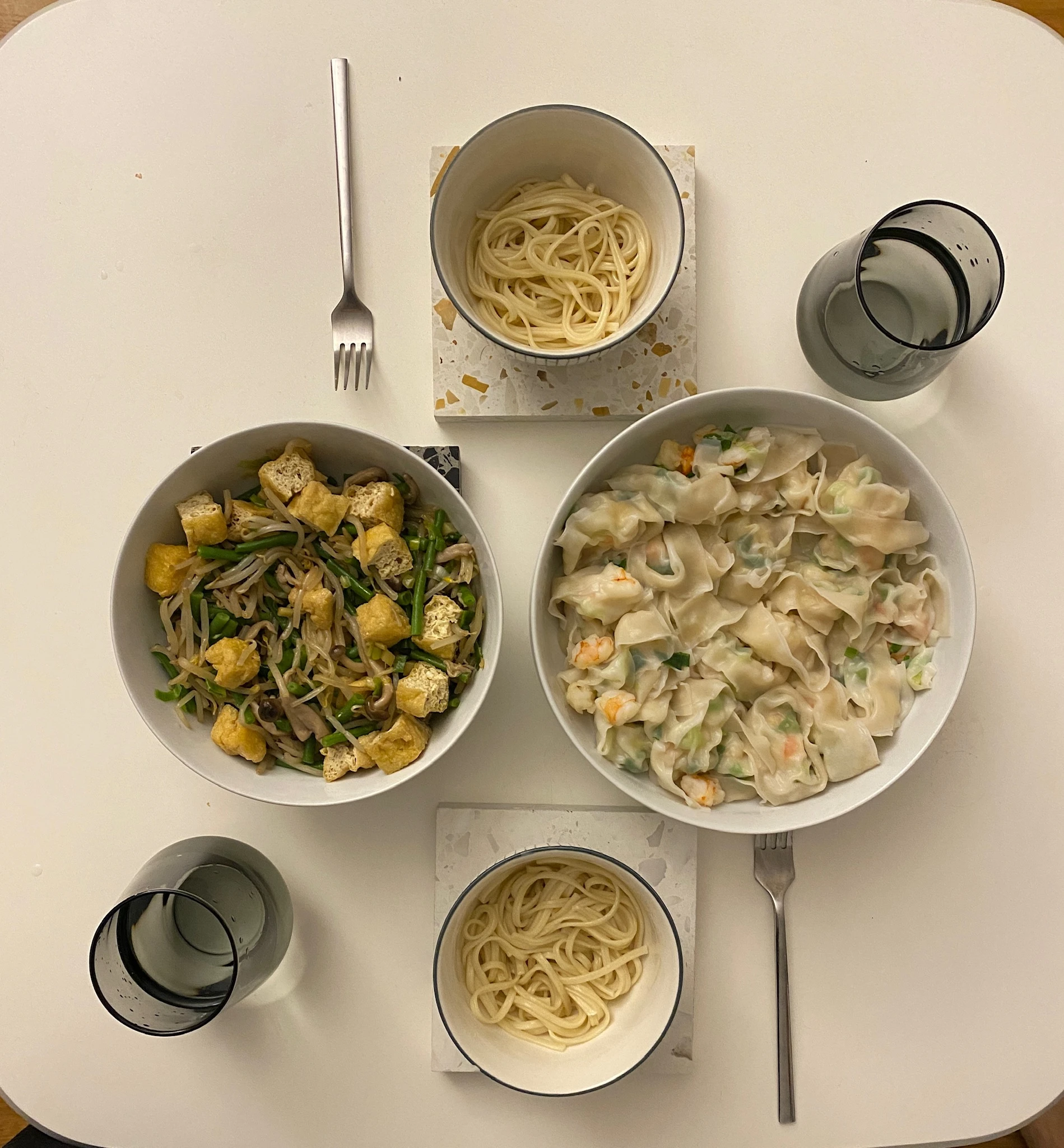 Dishes laid out on a table.