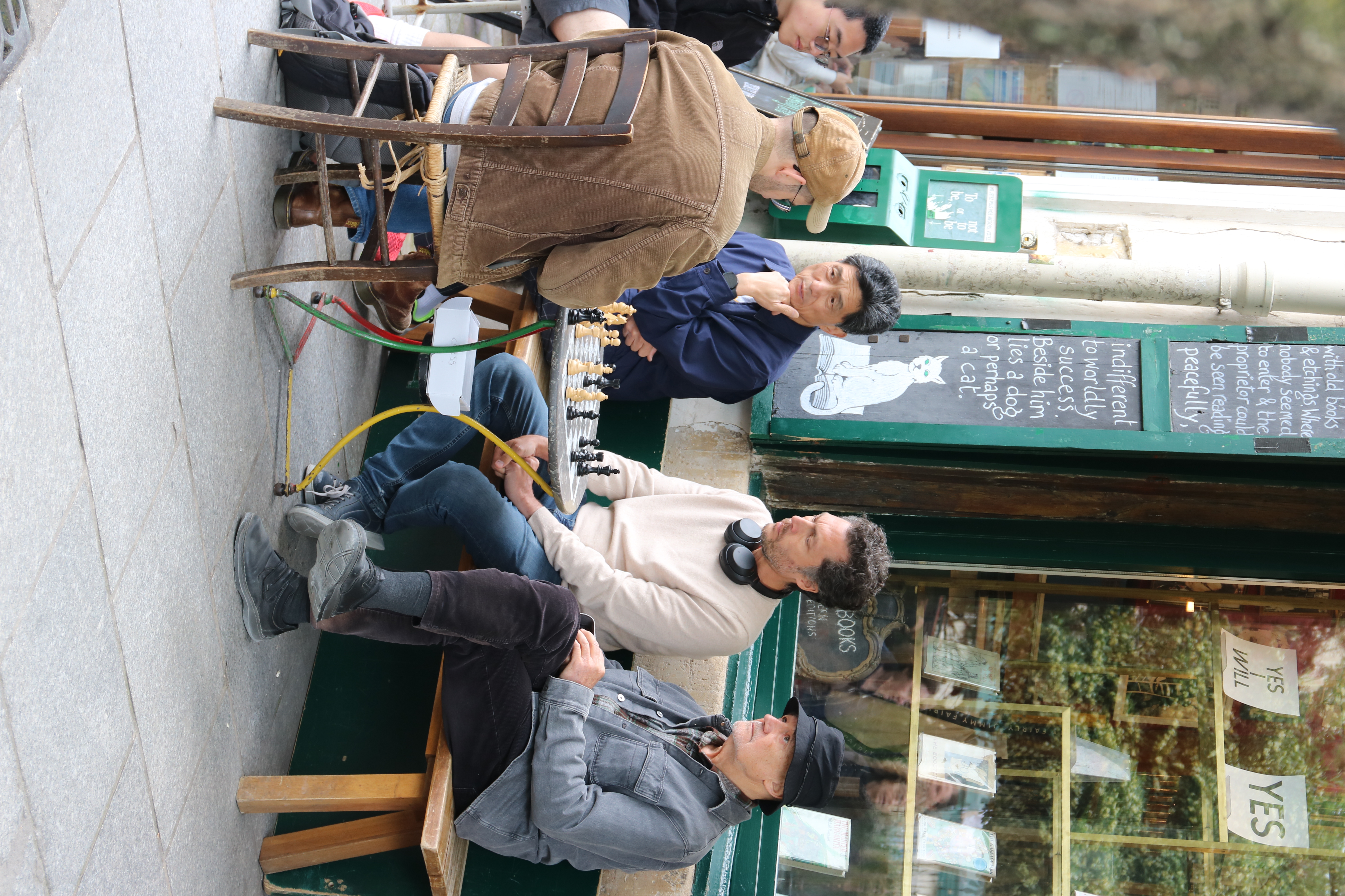 Men playing chess outside Shakespeare & Company