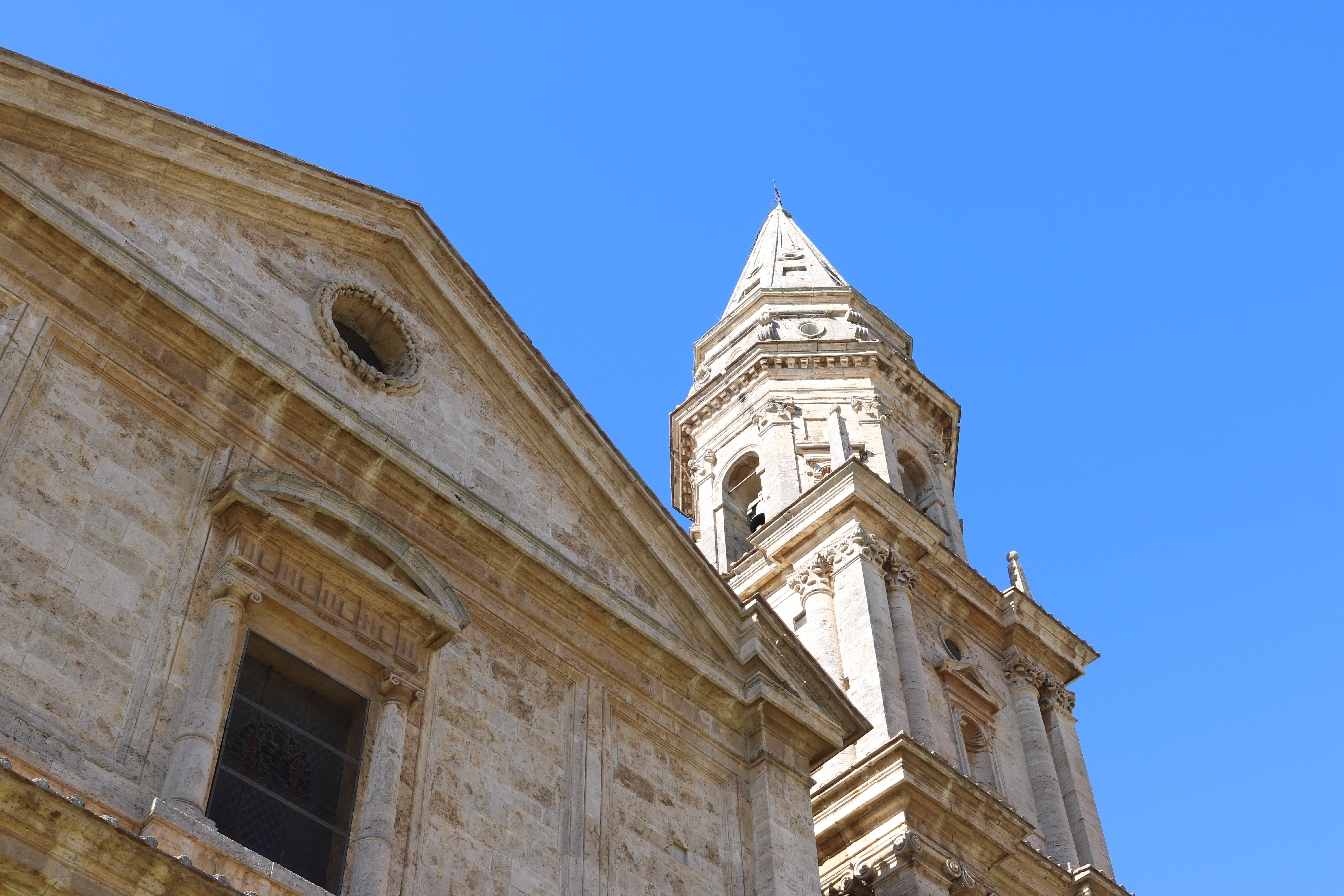 Looking up at the church spires from ground level.